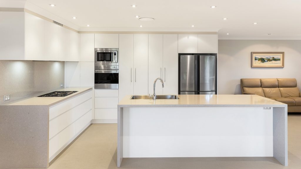 AFTER Menai Renovation, Satin Polyurethane kitchen with a Quantum Quartz benchtop